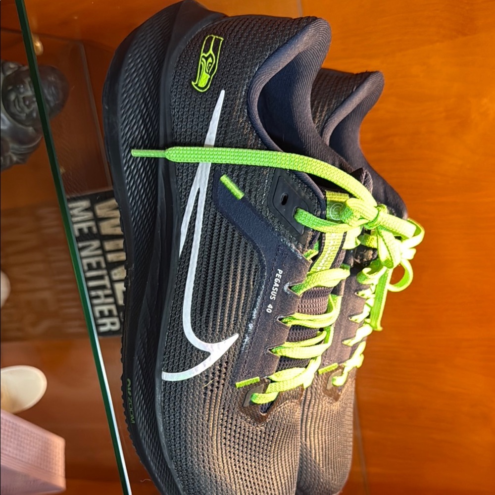 Nike Black and Green Athletic Shoes with Reflective Accents